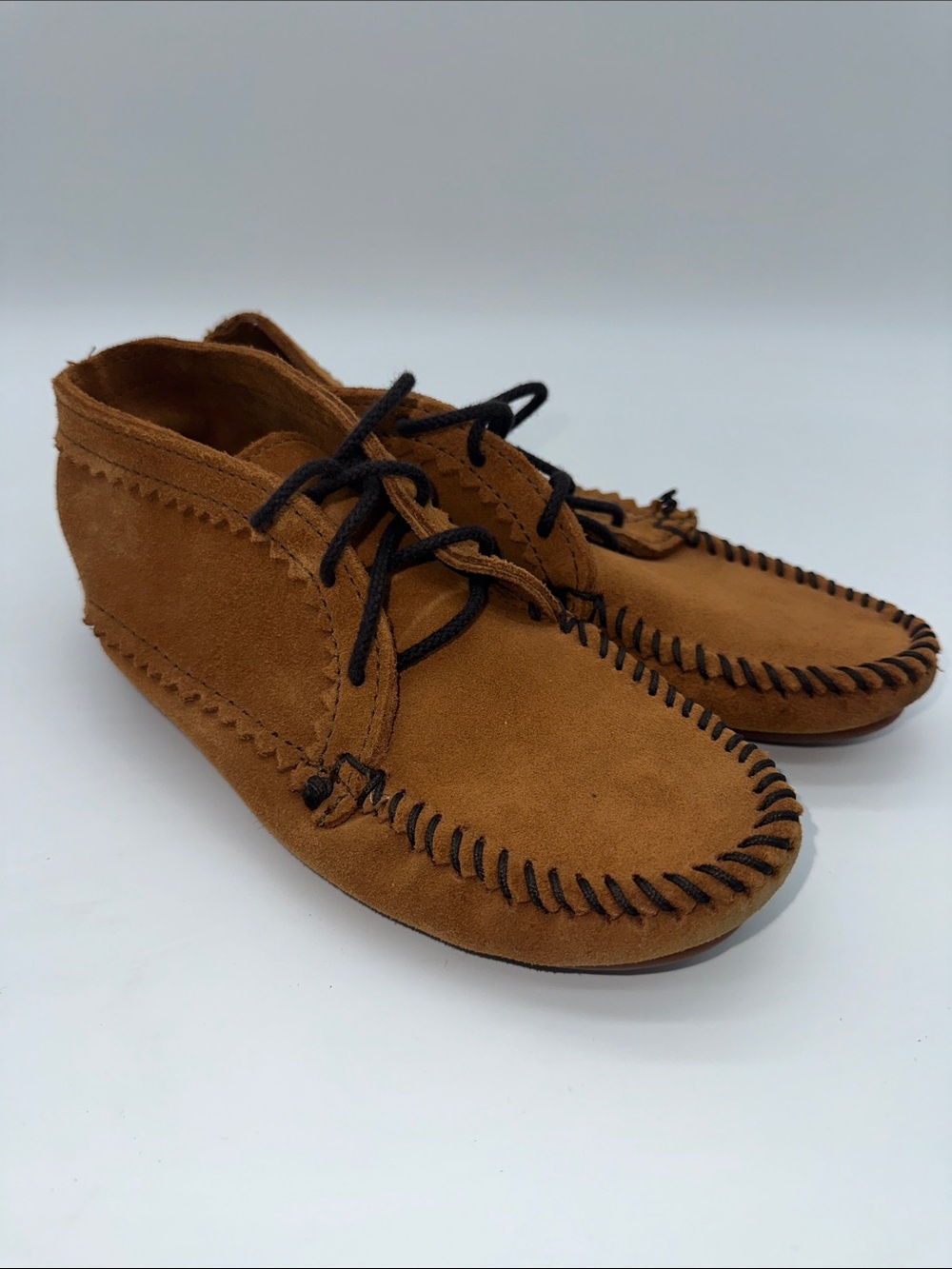 Minnetonka Chestnut Suede Moccasin with Black Whipstitch